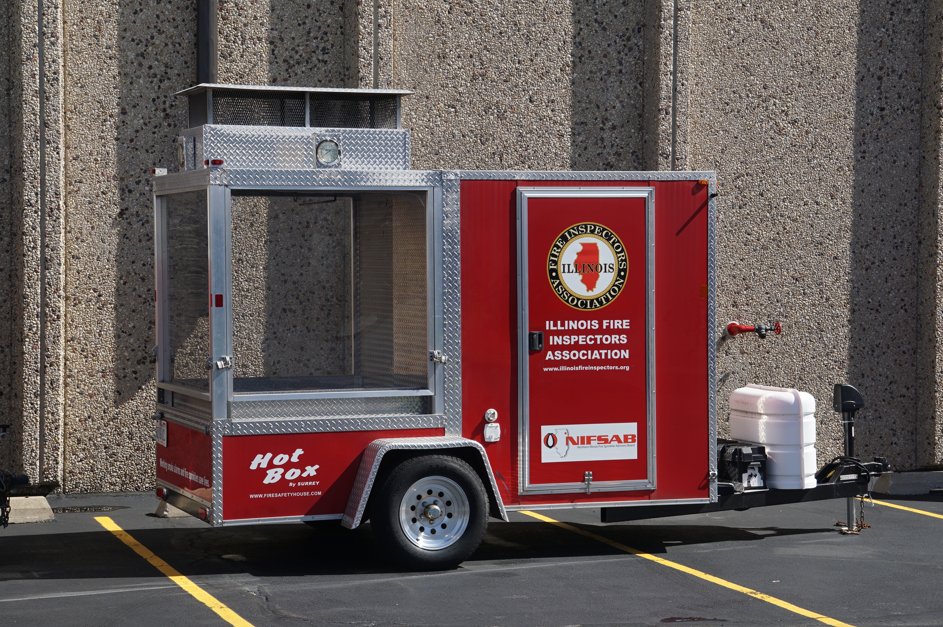 This is the "Pope Mobile" available from the Illinois Fire Inspectors Association. NIFSAB maintains this demonstration trailer and helps bring them out as needed. Contact the IFIA office to reserve a date.